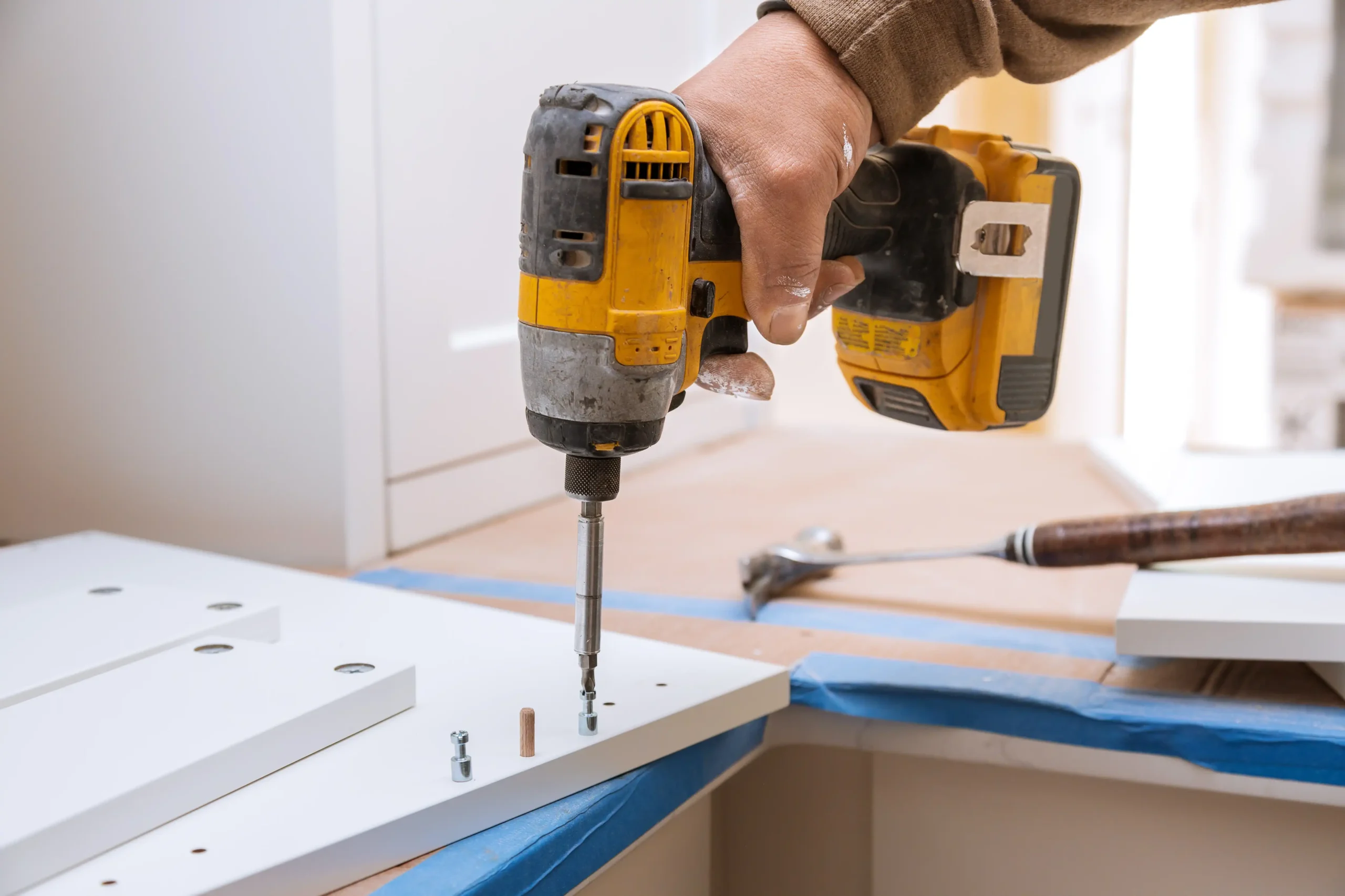 Inicio handyman drilling furniture assembly scaled